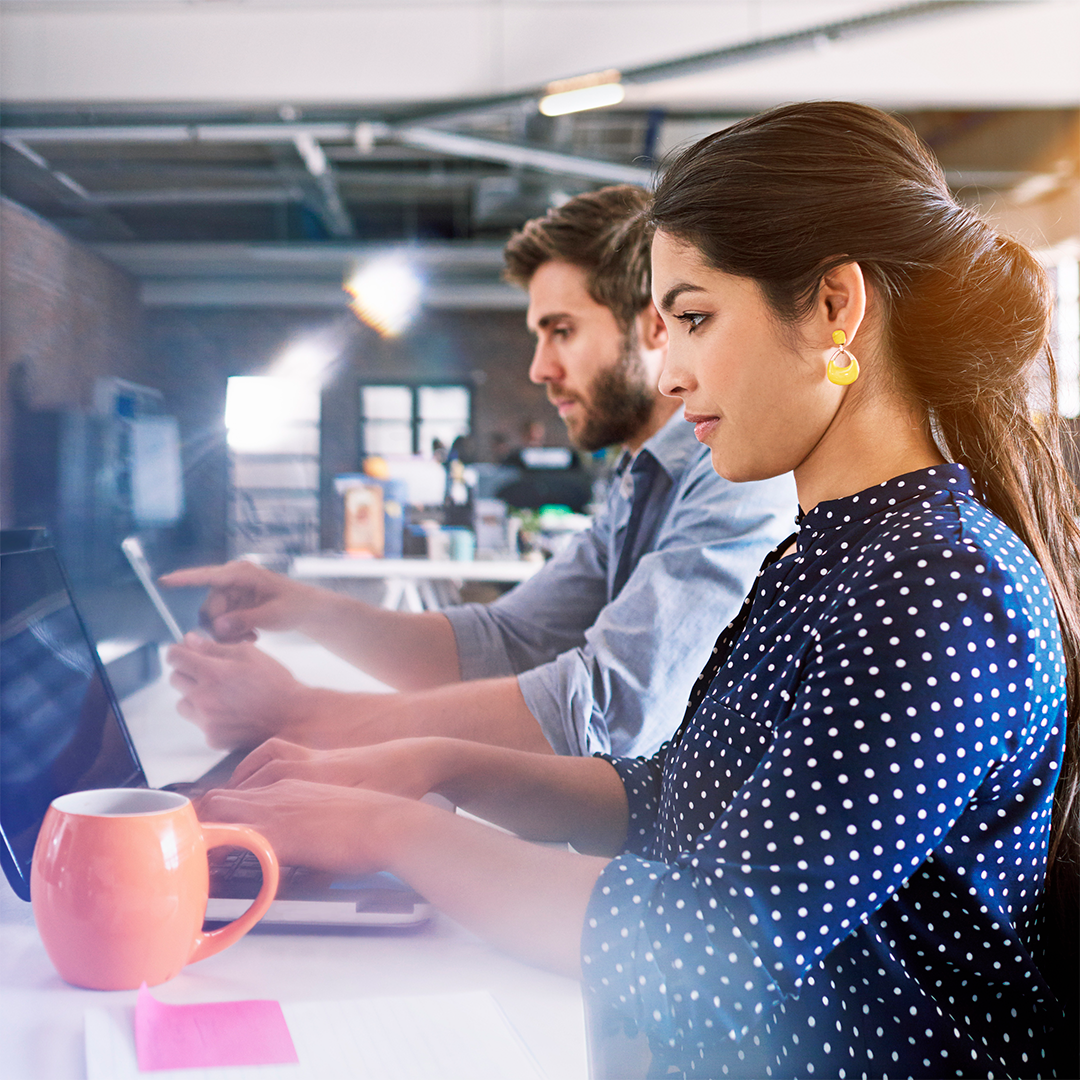 Woman sitting working on computer